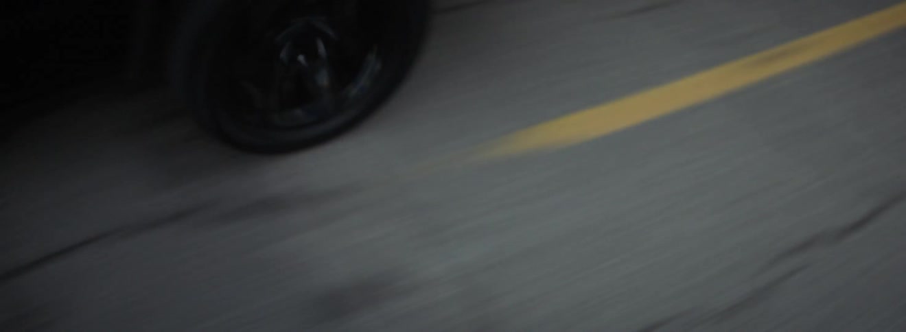 The truck races down the road
