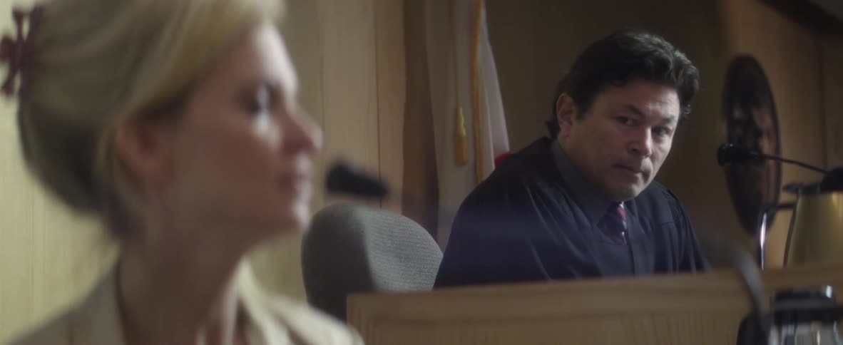 A judge is speaking to the court