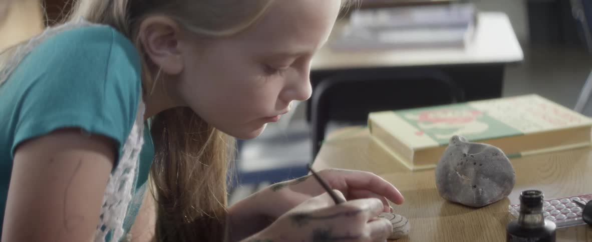 A child is drawing something