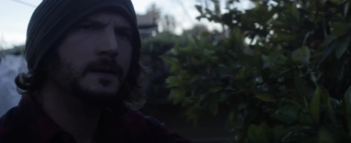 A man yells and points at someone