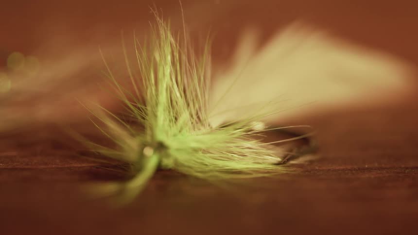 The fishing lure sits still on the table