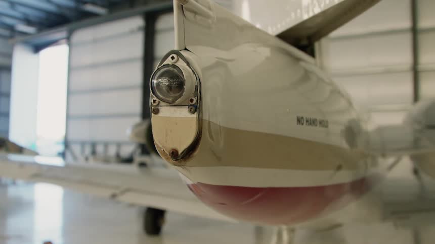 Airplane in a large airplane garage