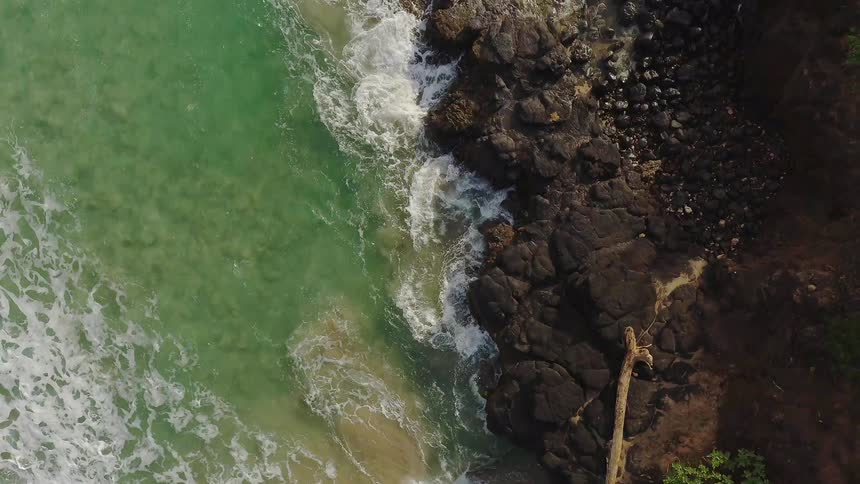 Ocean waves wash ashore a beach