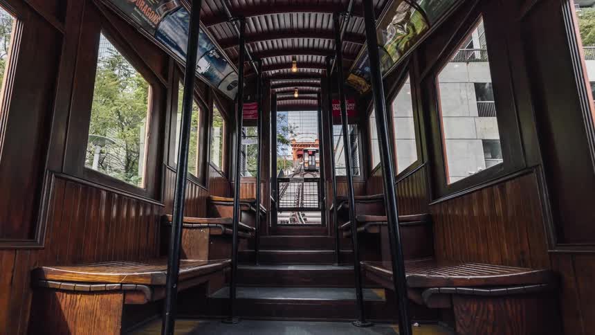 Inside a trolley navigating city streets