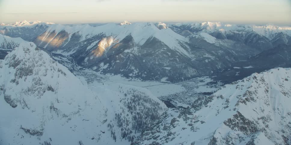 The mountain range is white with snow