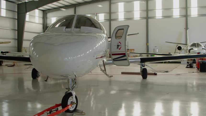 Airplanes parked in hangar