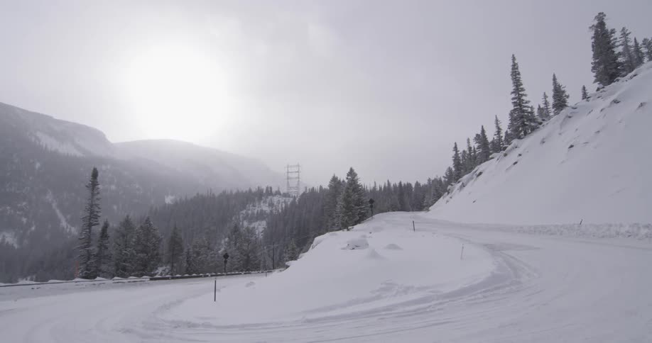 Snow covered roads on a cloudy day