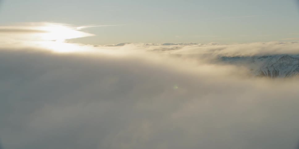 The heavy clouds cover the mountain range entirely