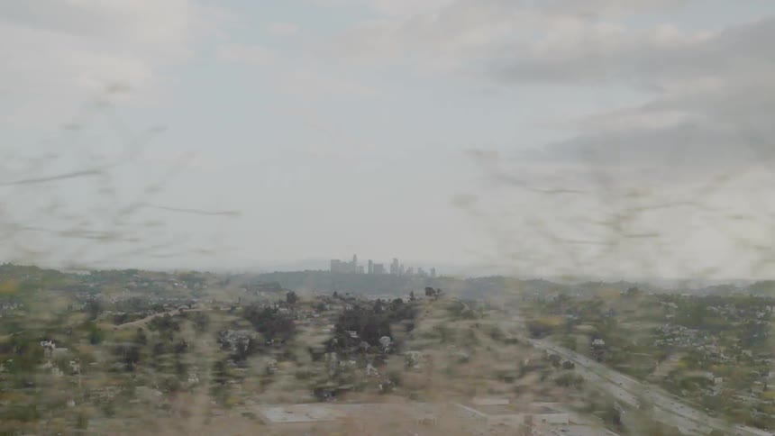 Clouds float above a city