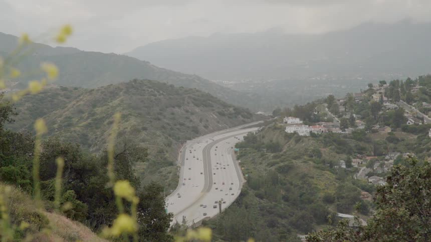 Cars drive on a highway