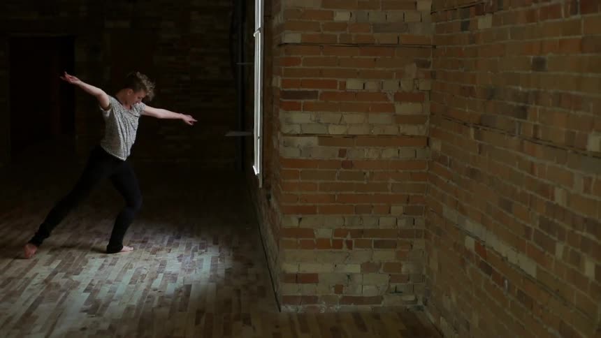 Person dancing in an empty studio