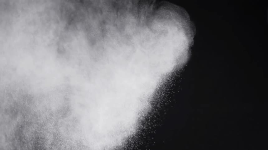 Smoke slowly filling a dark area