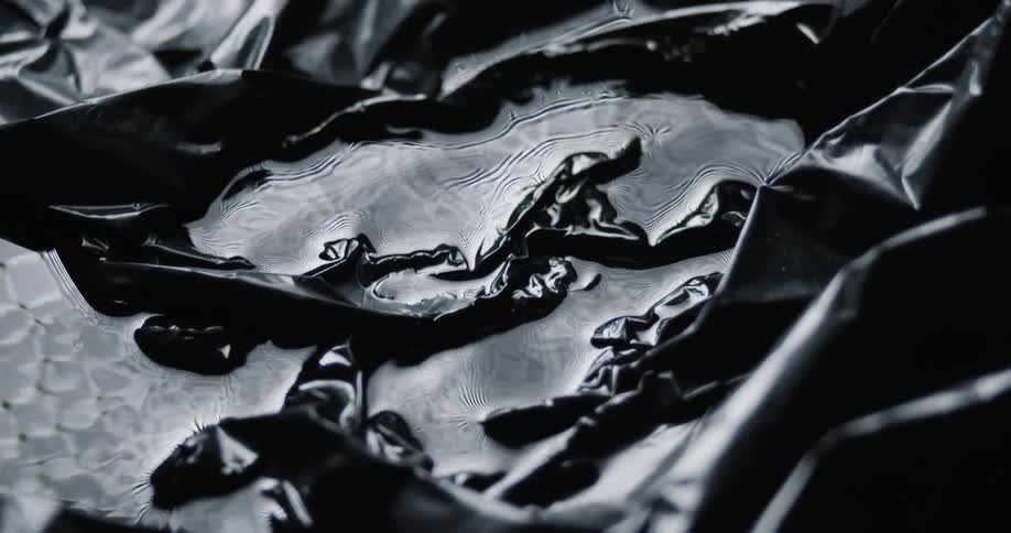 Water sits in wrinkled plastic