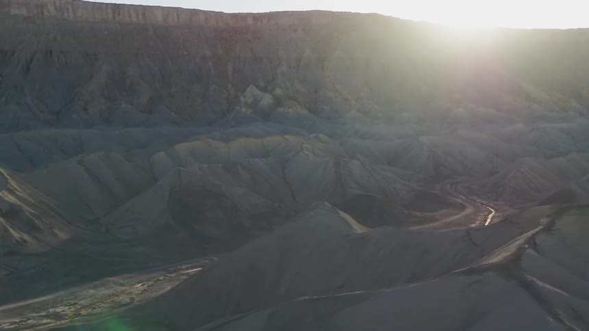 The sun shines into the canyon