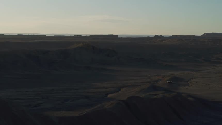Sandy hilly desert at sunset