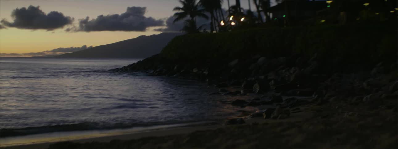 The tide flows in and out by the shore