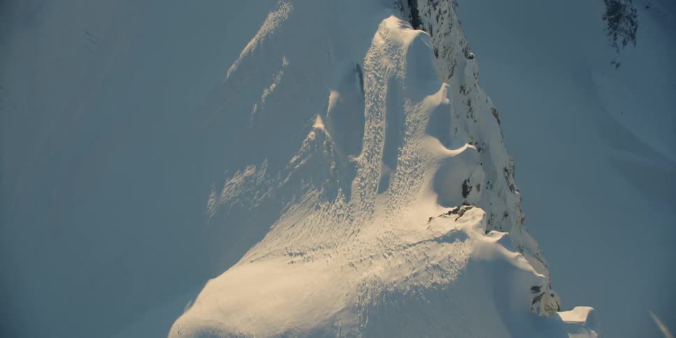 Snow covers the mountains