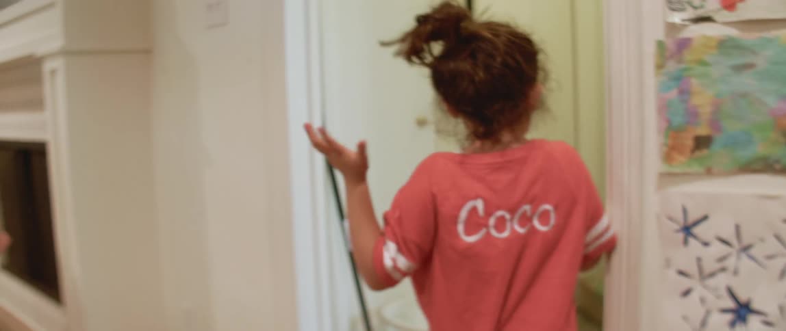 The children run through the home