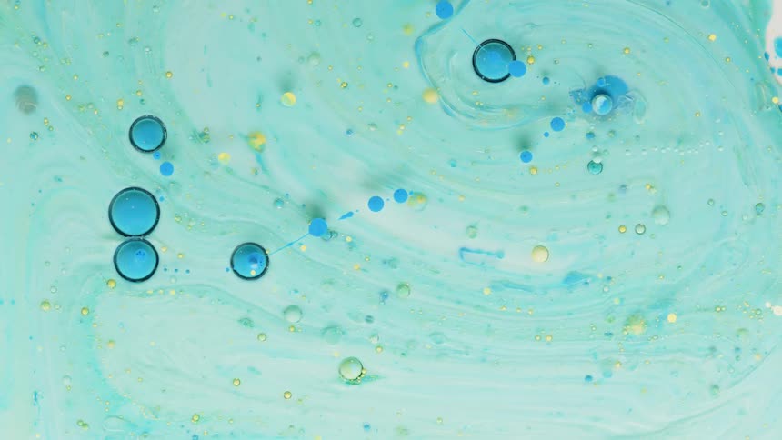 Different colors of bubbles and swirling liquid