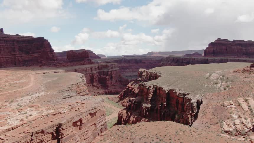 A canyon with a barren desert on each side