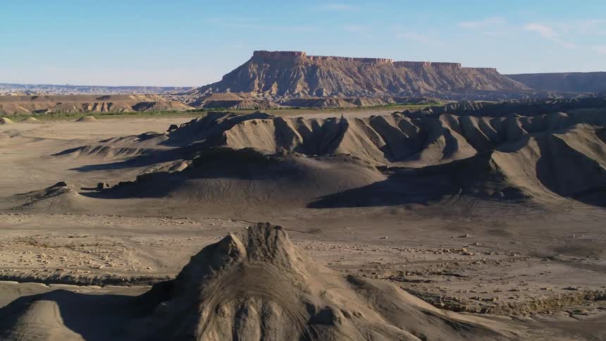 Sun shines over hilly desert