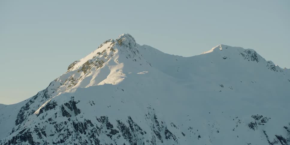 Snow covers the mountain