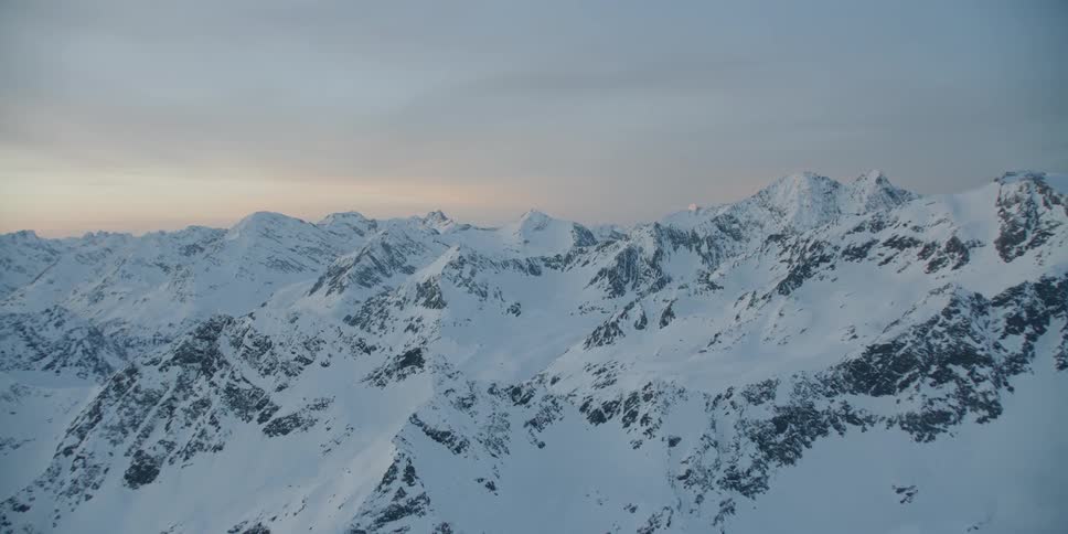 Snow covers the mountain landscape