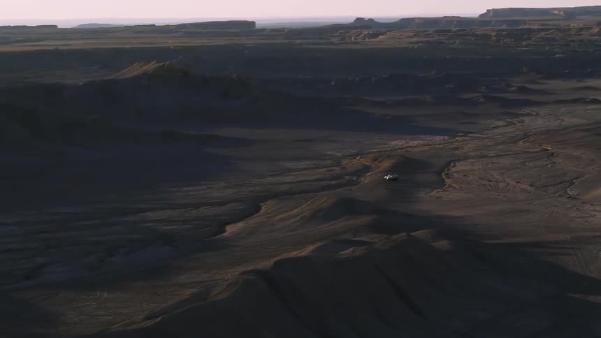 The desert is barren at sunset