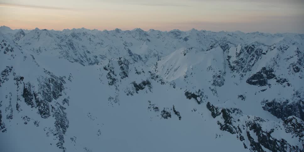 Snow covered ridges at sunset
