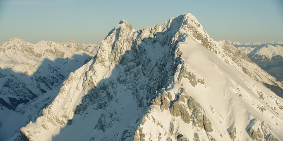 Snow covers a mountain peak