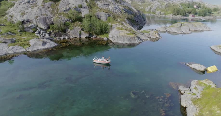 Boats float on a mountain lake