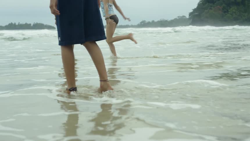 The people are playing in the water together