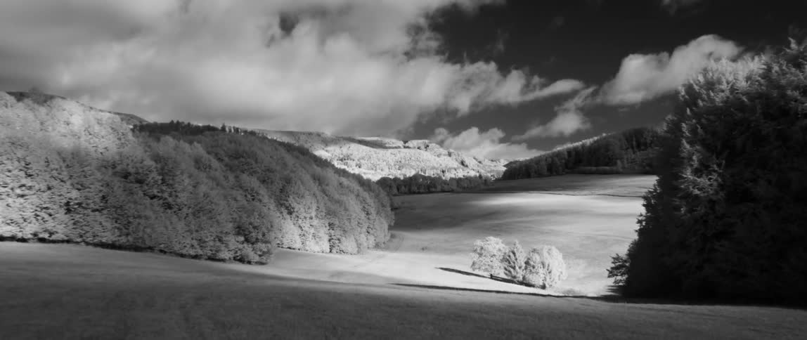 Clouds roll over hilly plains