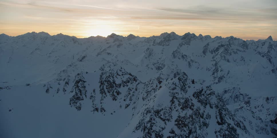 Snow covered ridges at sunrise