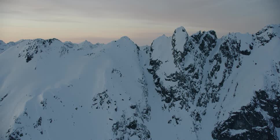 Snow covers the mountain landscape