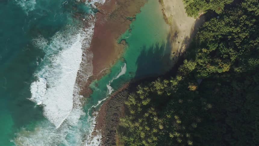 Ocean waves flow towards the shoreline