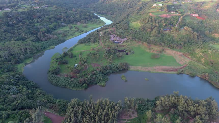 A river flows through a rural landscape