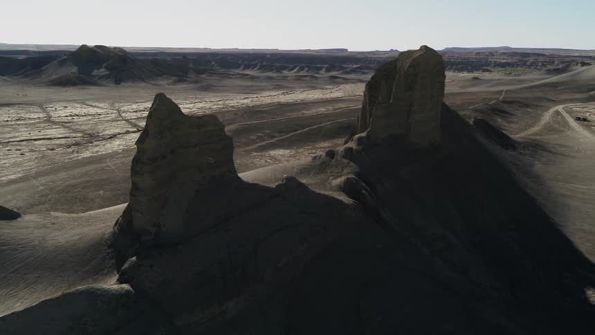 Dry river bed cuts through a canyon