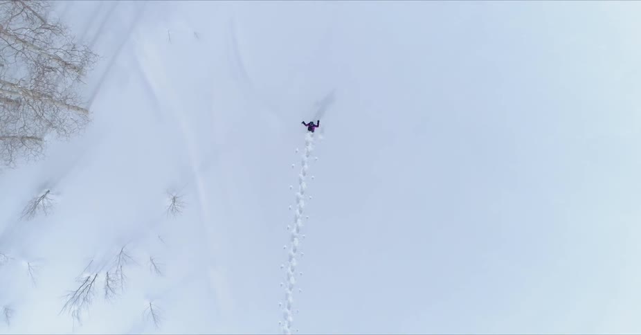Person walks through the snow