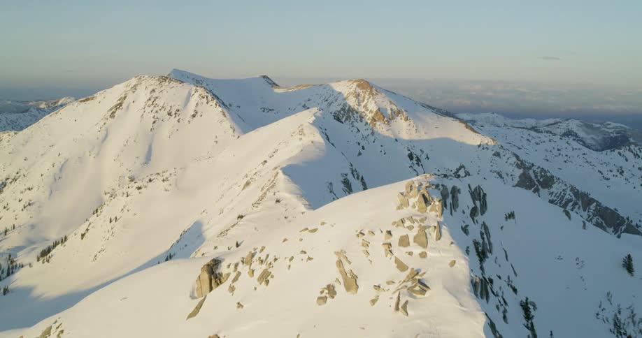Snow covers mountains in the wilderness