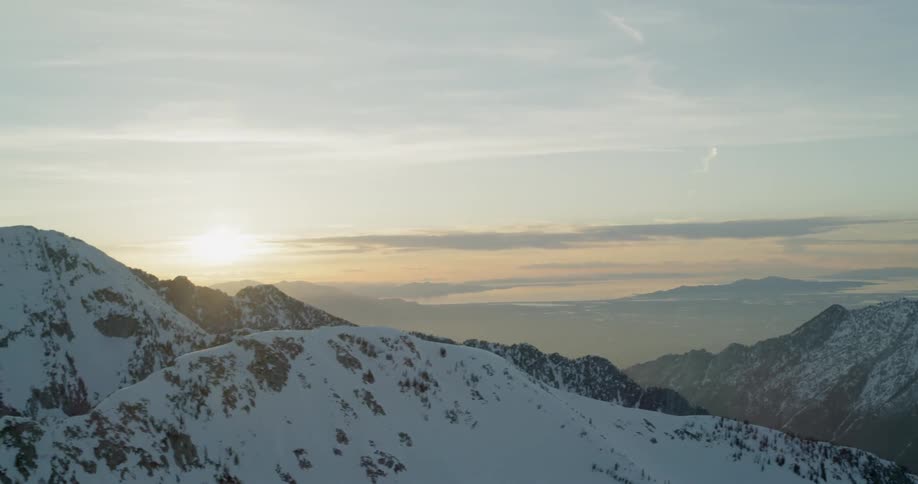 At a mountain top looking down into a valley