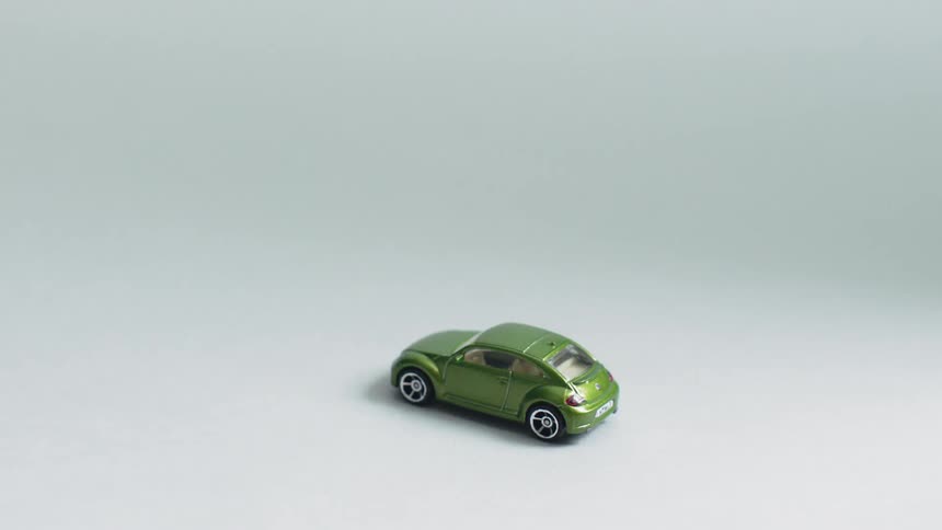 Toy cars sits on a floor