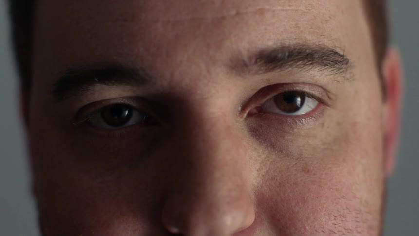 Man stares straight forward