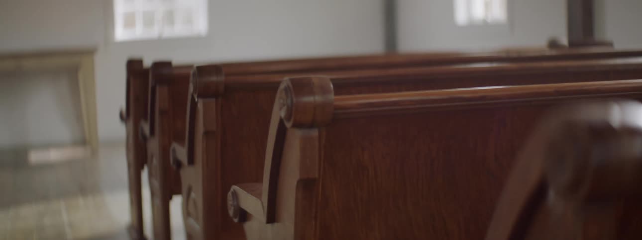 Rows of pews in a church