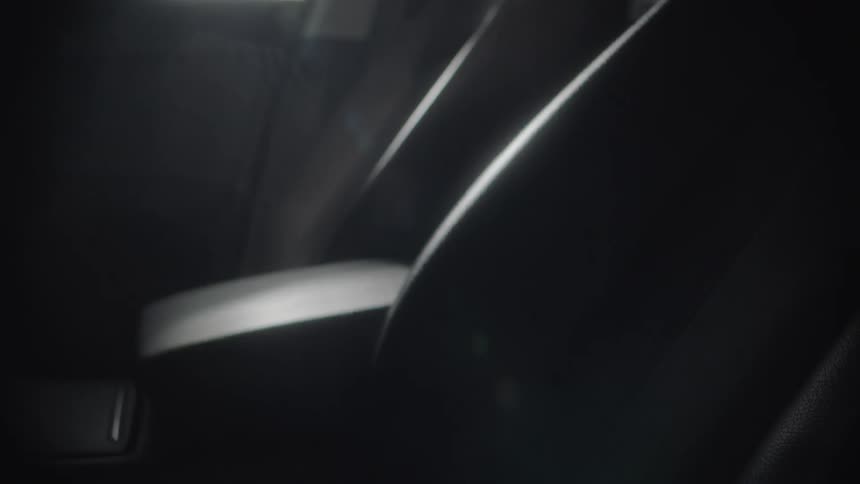 The light shines in the window on the vehicle seats