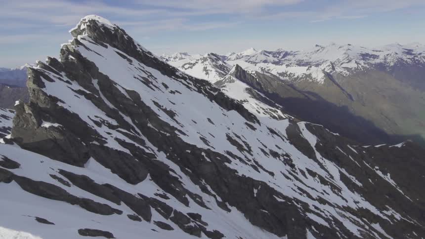 Snow covers a mountain range