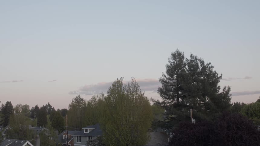 Sun sets over a neighborhood