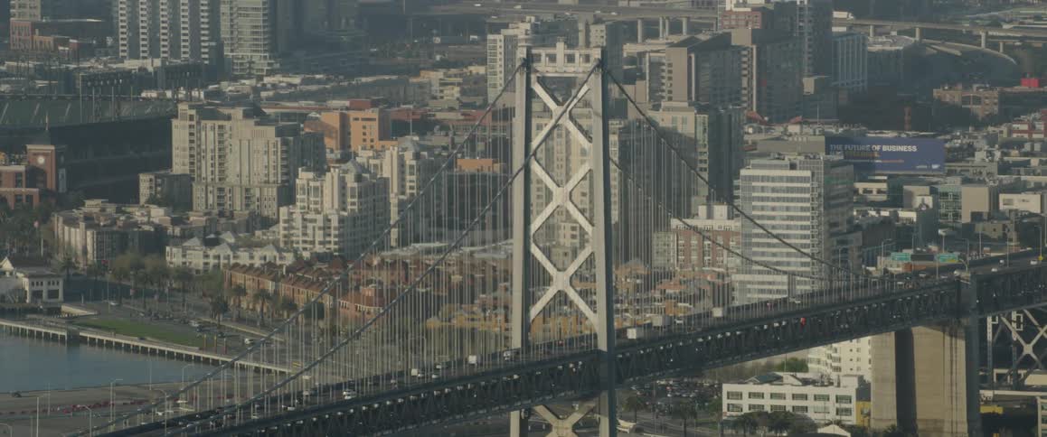 Traffic moves across a city bridge