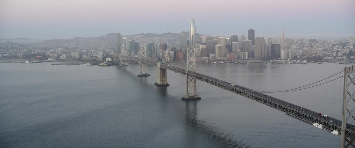 The city ahead is covered in light fog