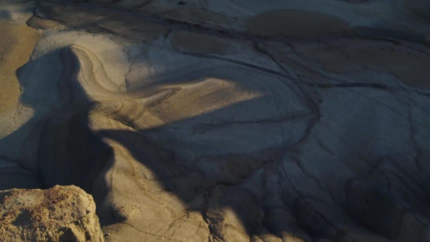 Sandy hilly desert at sunset
